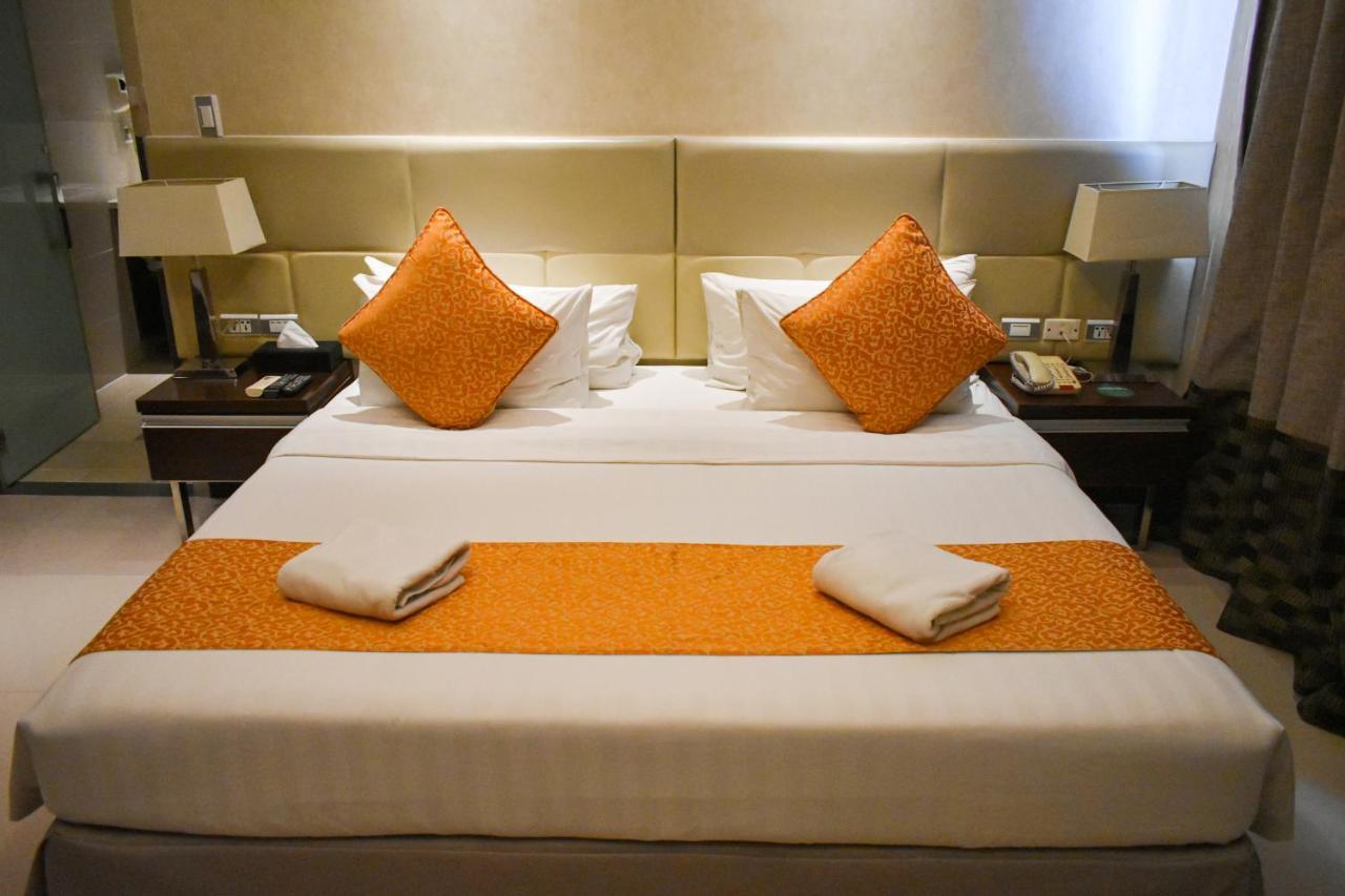 Mg Grand Hotel โอลองกาโป ภายนอก รูปภาพ