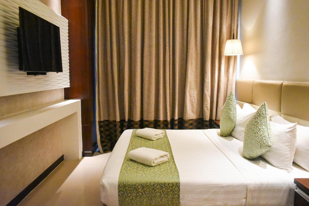 Mg Grand Hotel โอลองกาโป ภายนอก รูปภาพ