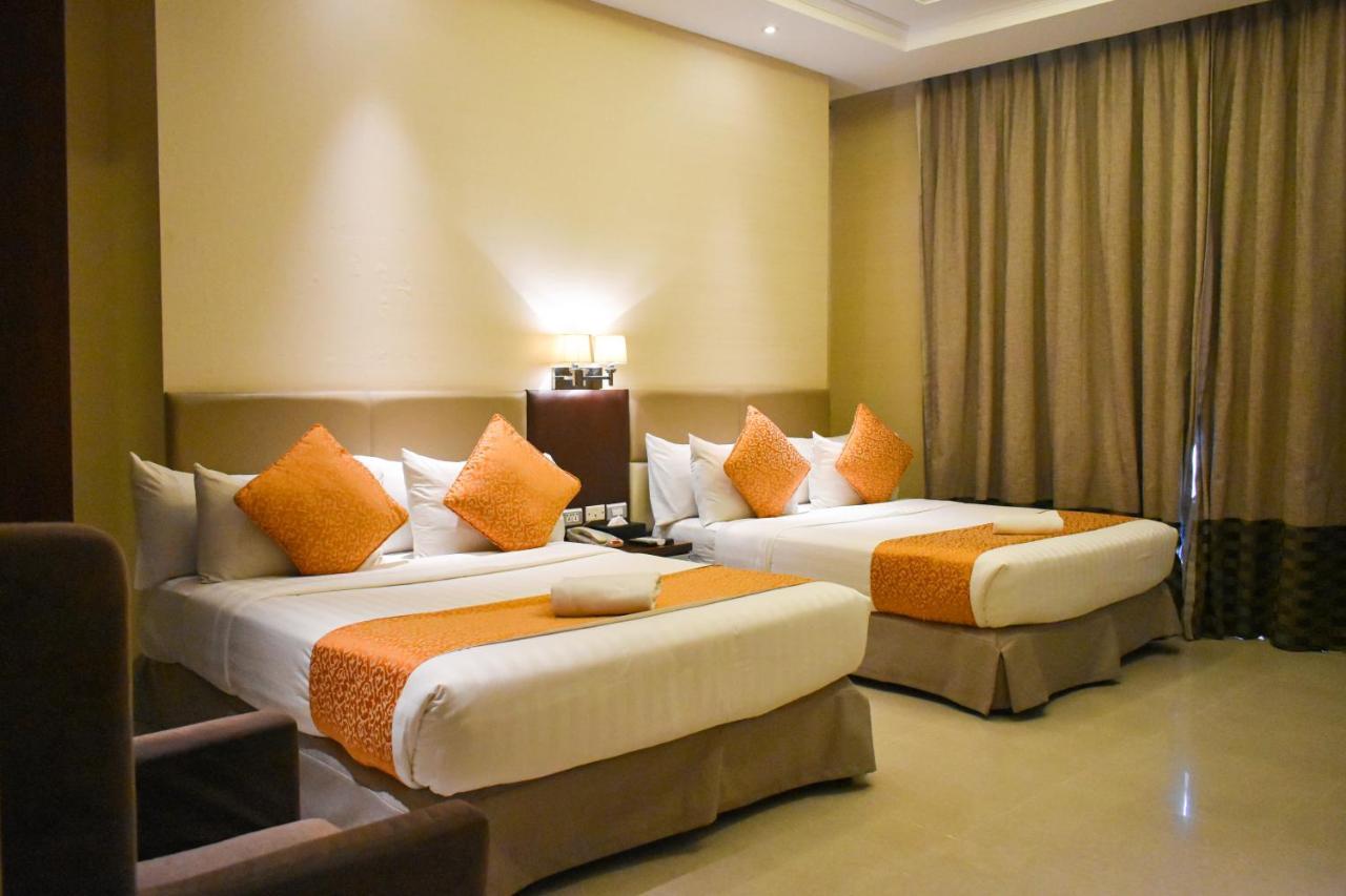 Mg Grand Hotel โอลองกาโป ภายนอก รูปภาพ