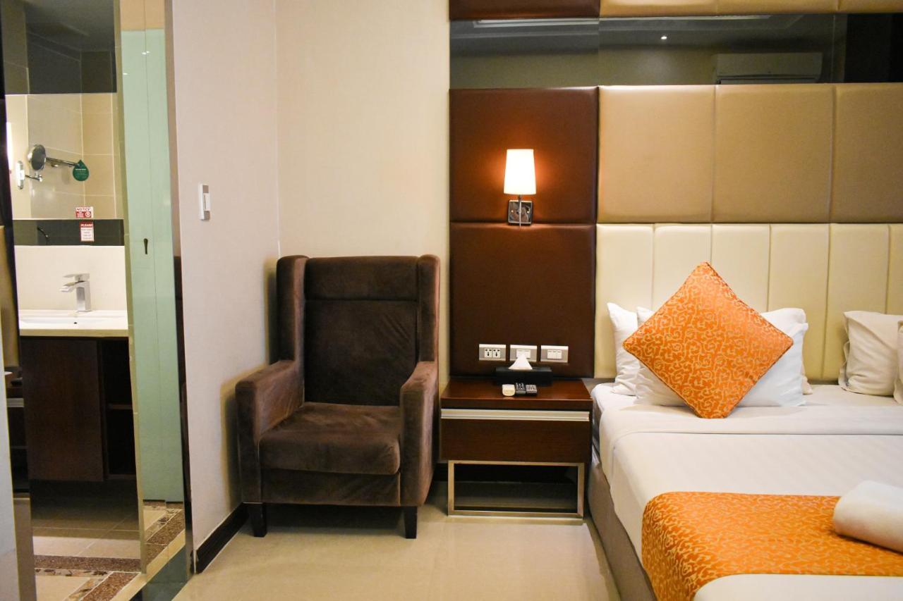 Mg Grand Hotel โอลองกาโป ภายนอก รูปภาพ